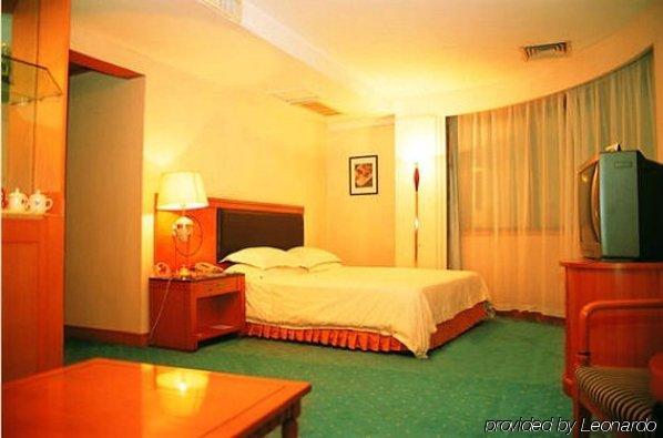 Crown Hotel Wuhan Quarto foto